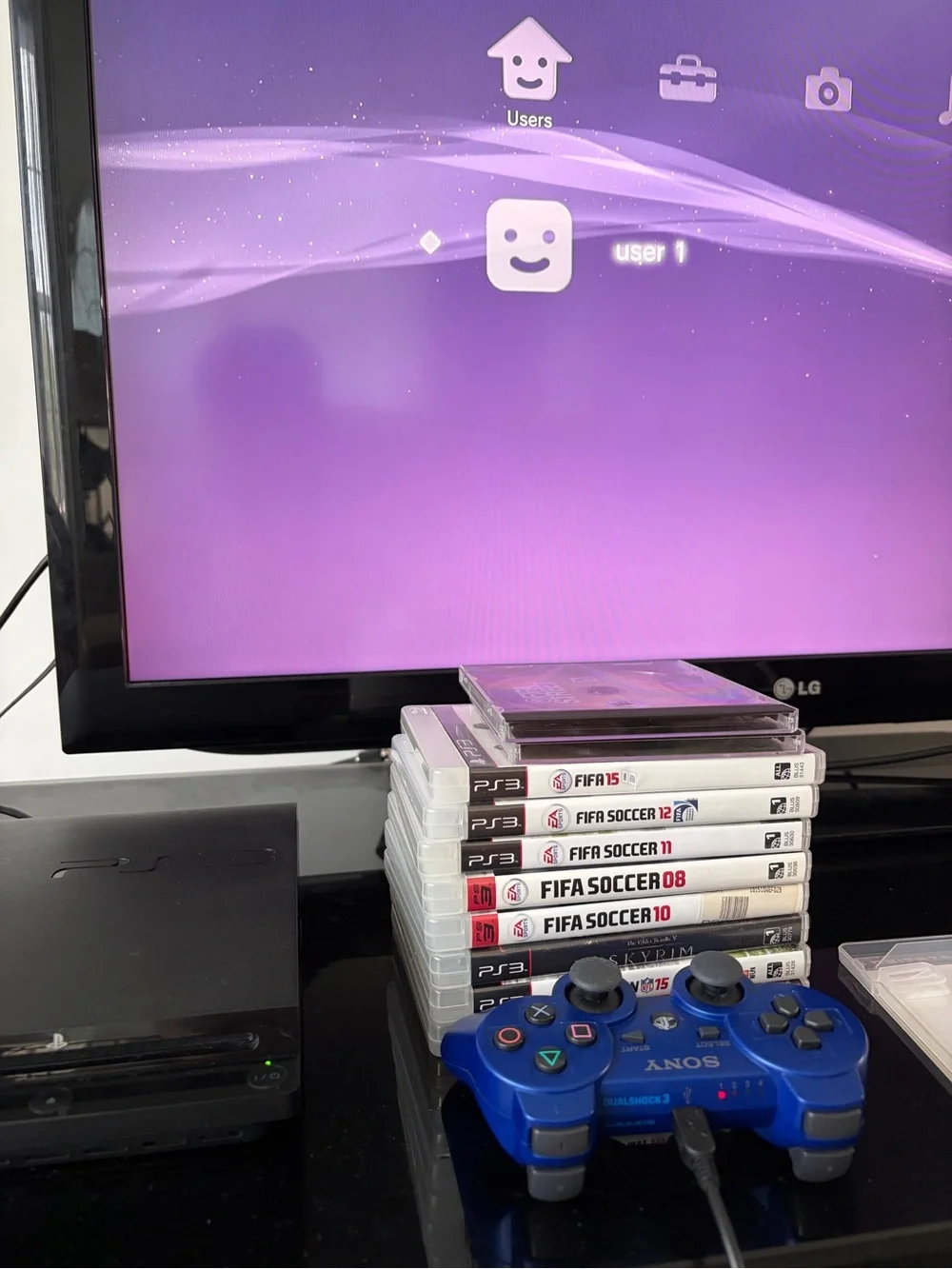Sony PS3 Slim Black Console with Blue DualShock 3 Controller & 11 Game Bundle